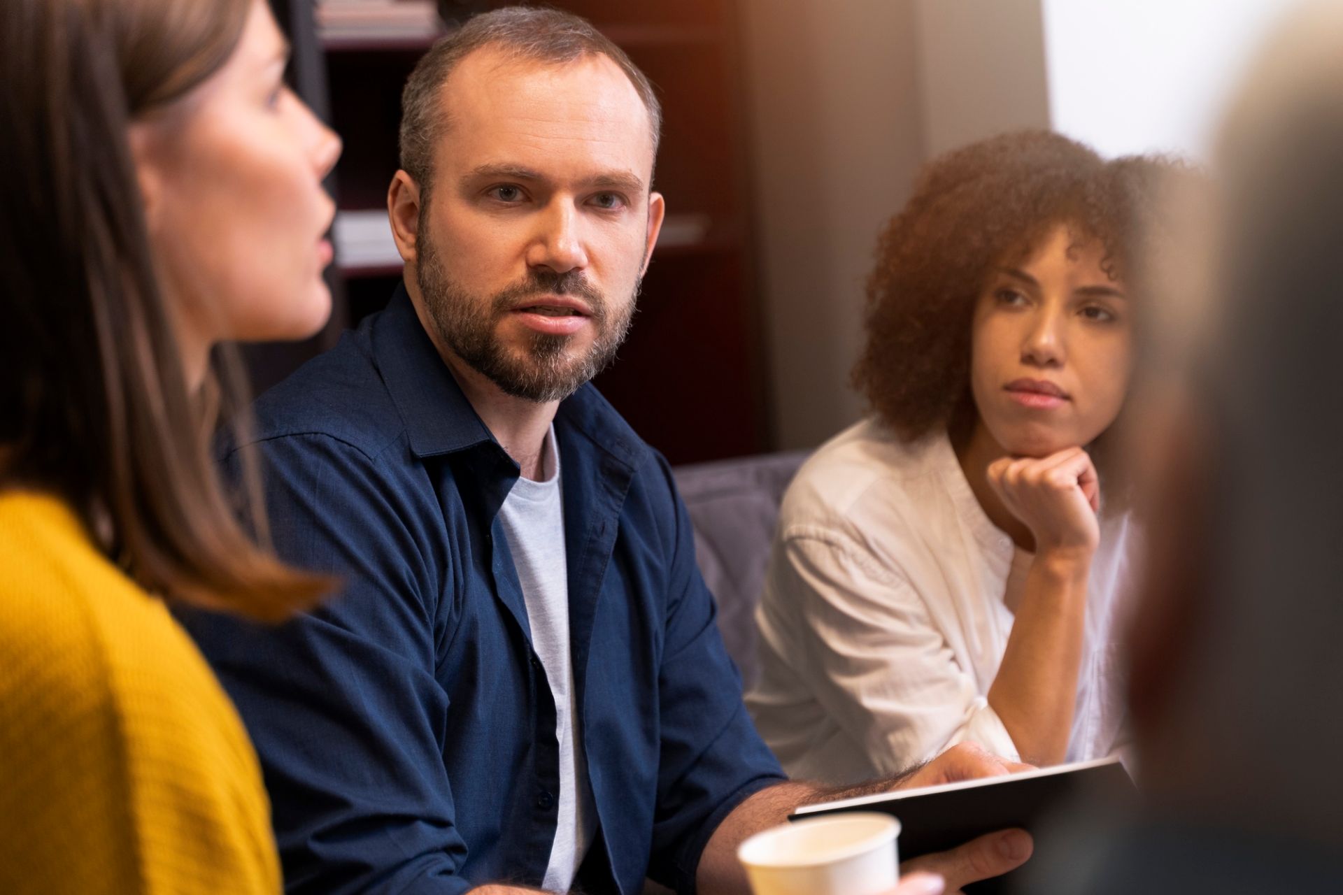 People in a group discussing a project